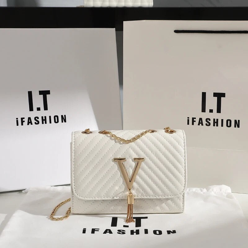 Luxury Embroidered Crossbody Bag with Sequined Tassel Nyzzle